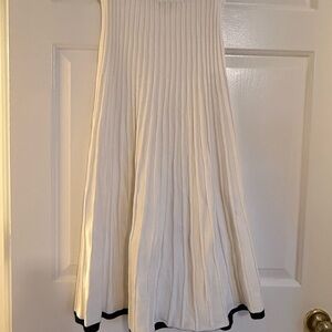 Chic White A-Line Skirt with Black Hem